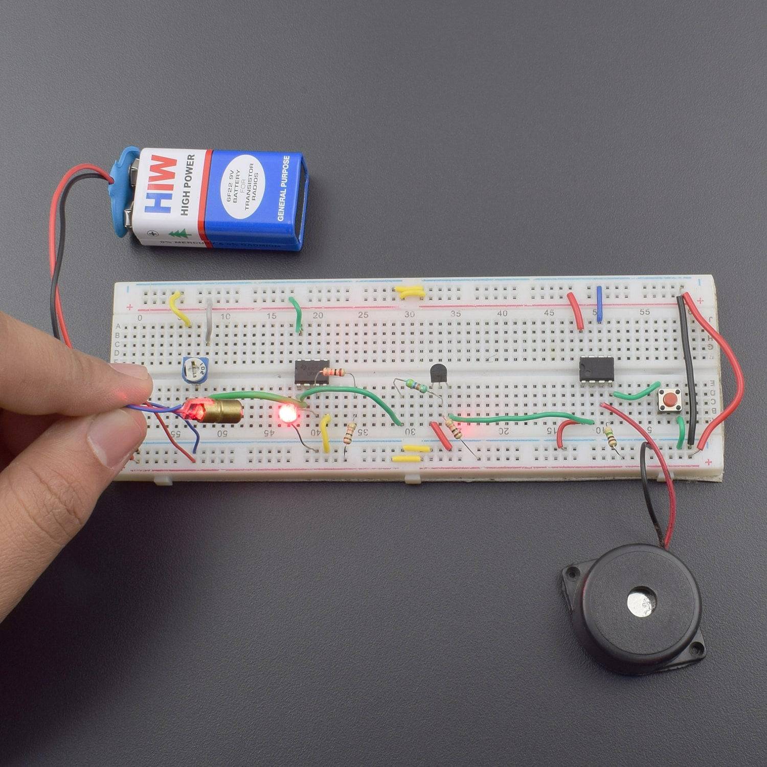 Make a Laser security system using 555 Timer IC and LM358 IC - KT949